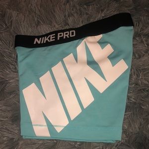Blue and white nike pro spandex size small